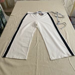 New,DANSKIN  cotton blend , white sport pants, size small.